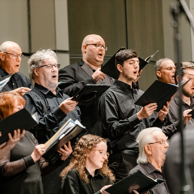 Midland Center Chorale singers performing together.