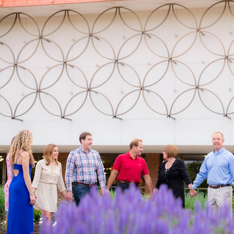 People holding hands outside of Midland Center for the Arts