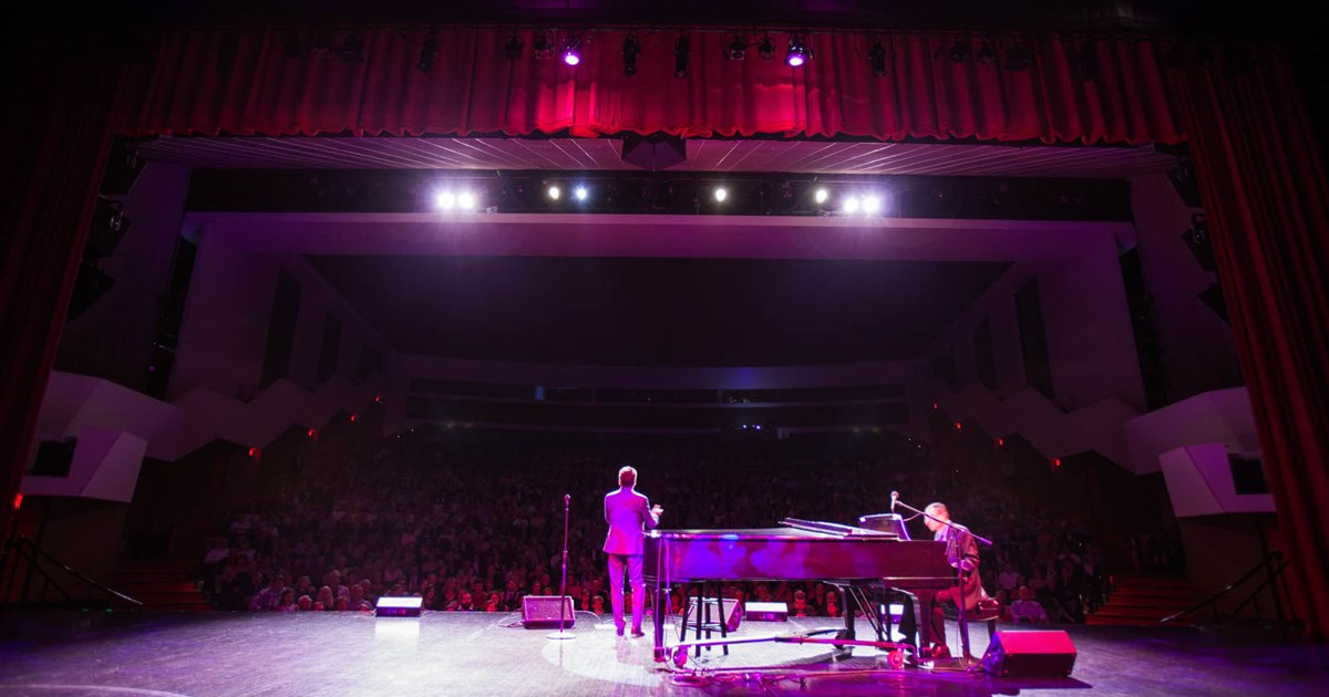Audiences attending a performance at the Center