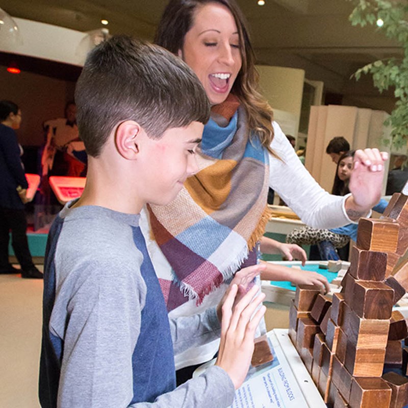 Boy playing with blocks in the museum