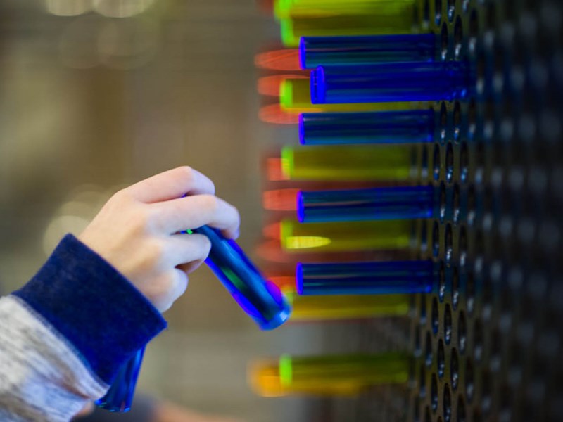 Kid interacting with museum exhibit