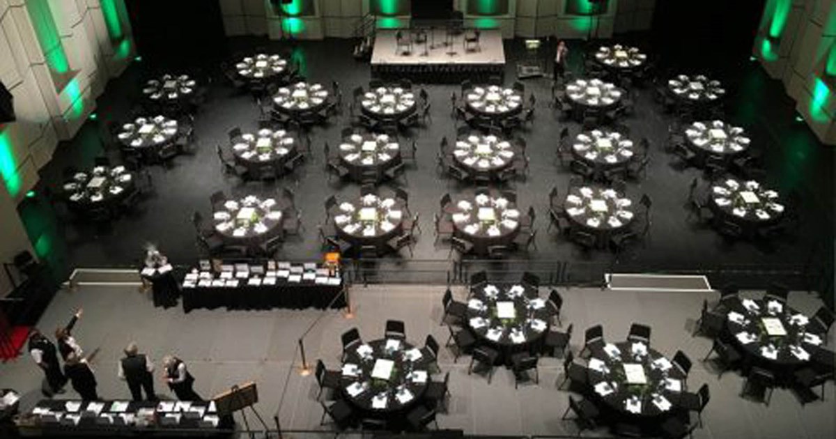 tables on stage in the auditorium
