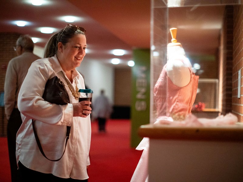 Interacting with costume exhibit