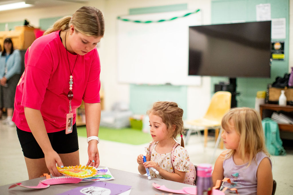 Teacher teaching an interactive lesson to students in a classroom